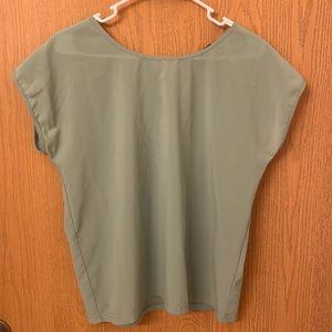 Green blouse with bow accent